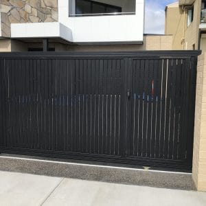 Black vertical slat sliding gate with 10mm+ gap aluminum design for modern residential driveway security