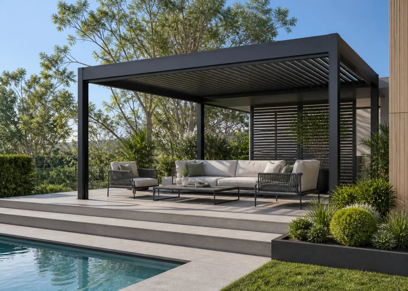 Aluminum patio shelter covering an outdoor living and dining area
