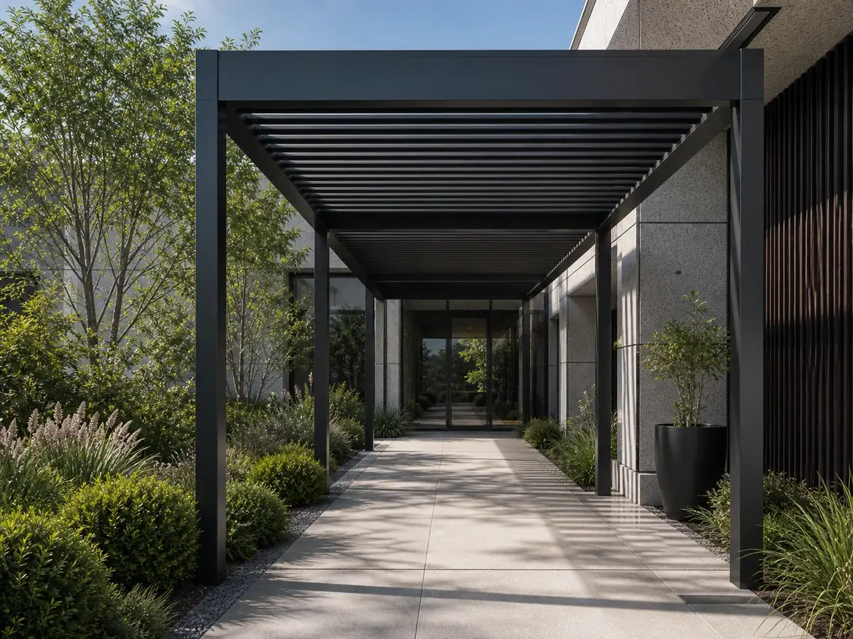Aluminum walkway shelter covering a building entrance path