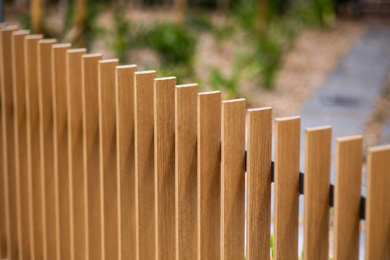 Oak timber look aluminium blade fence panels